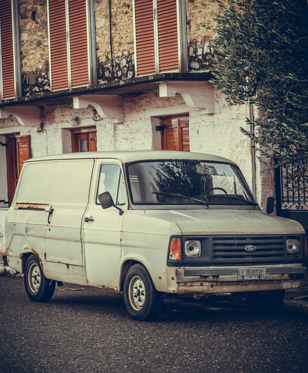 white Ford van parked outdoor