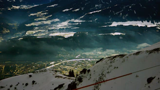 A scenic mountain valley in northern Pakistan with travelers enjoying the view.