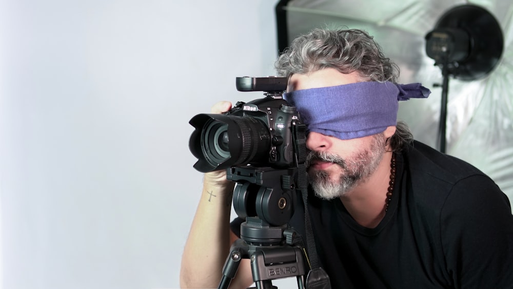 camera man with blindfold