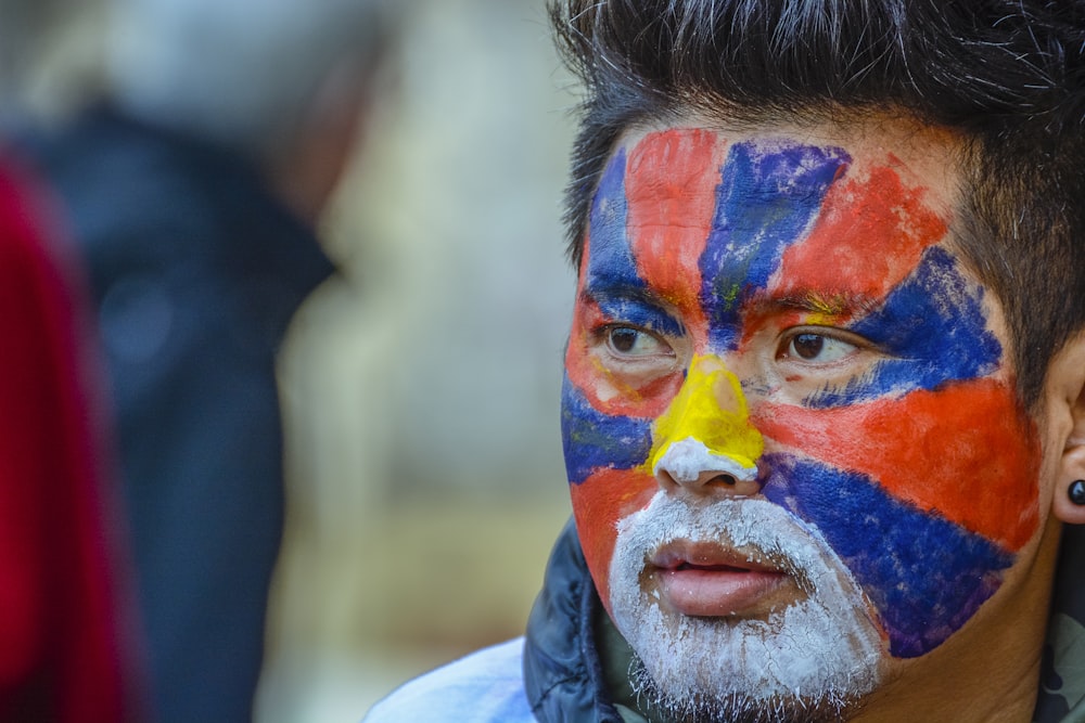 man with multicolored painting