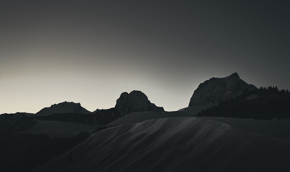 grayscale view of sand dunes