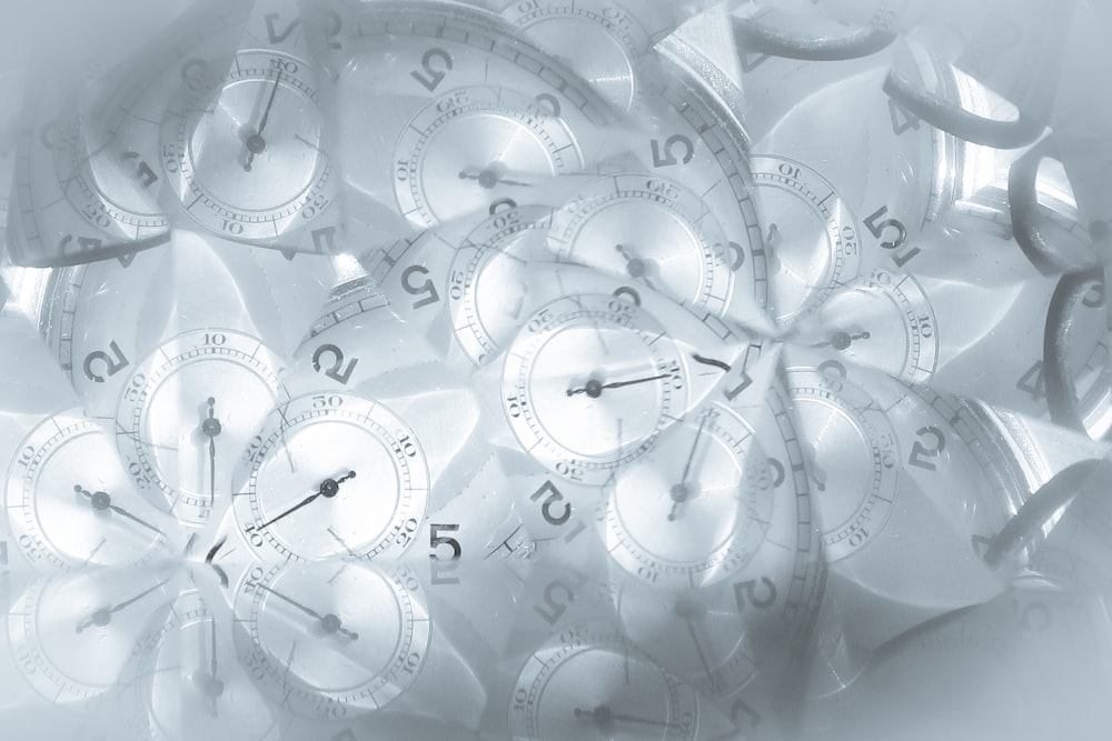 white and gray analog clock