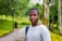 selective focus photography of man in gray crew-neck shirt