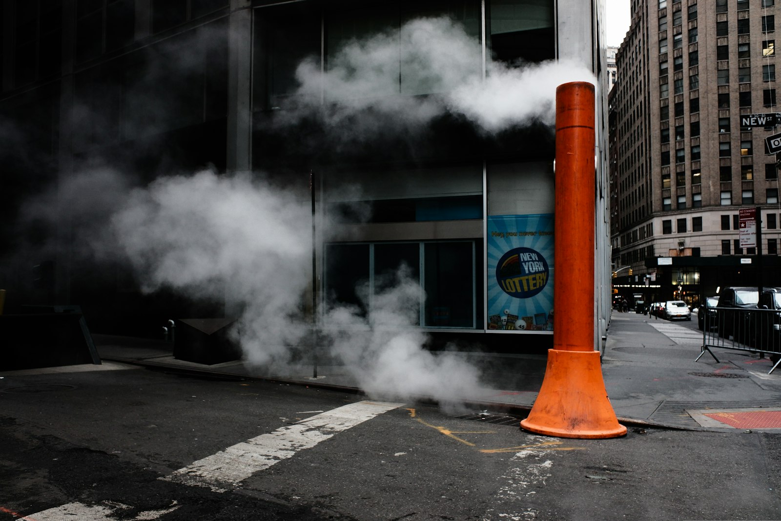 Fujifilm XF10 sample photo. Orange post near building photography