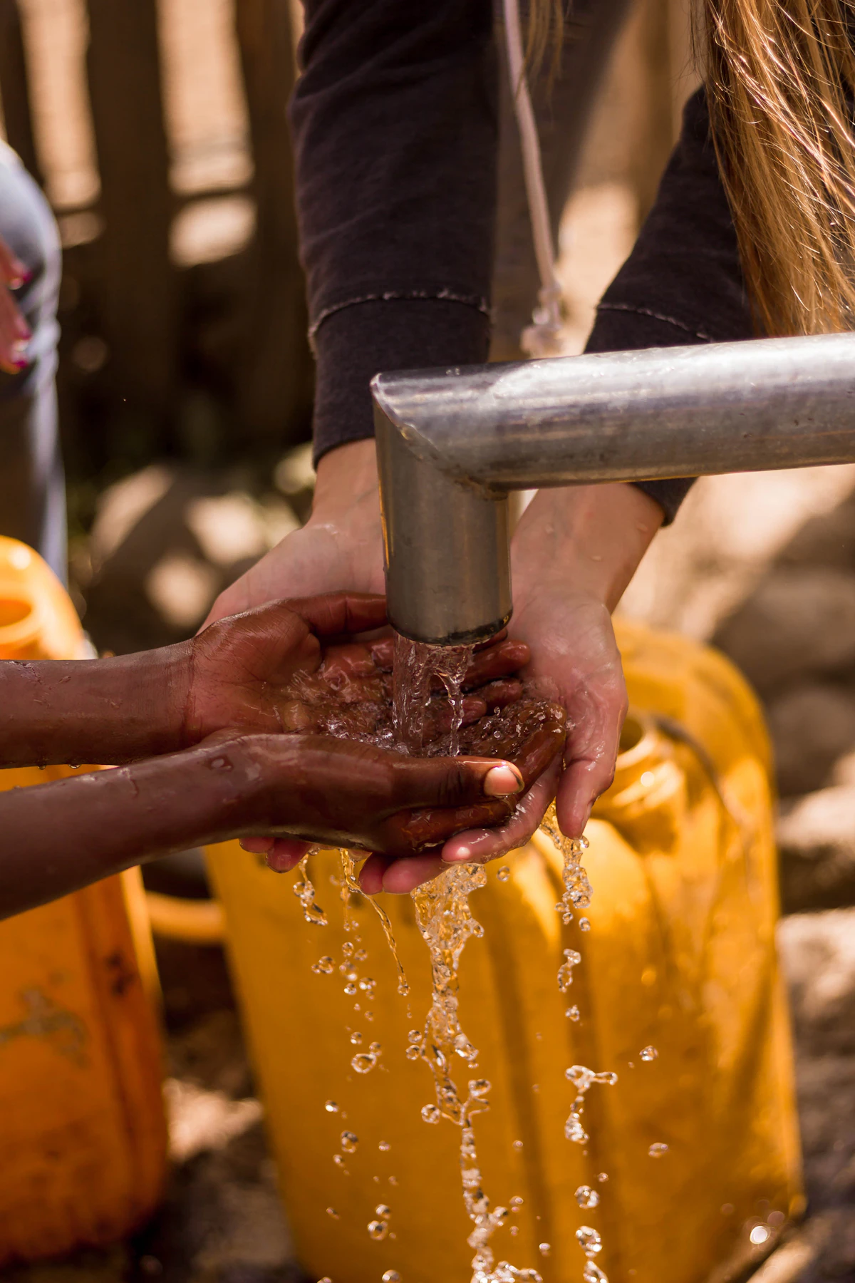 Collecting clean water at a community tap