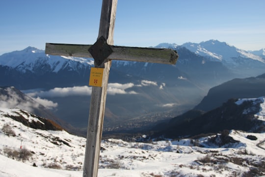 brown wooden cross in La Toussuire France