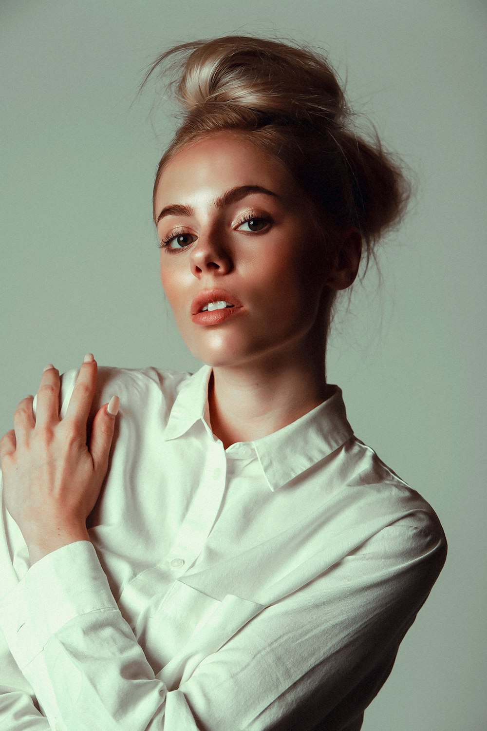 woman in white dress shirt