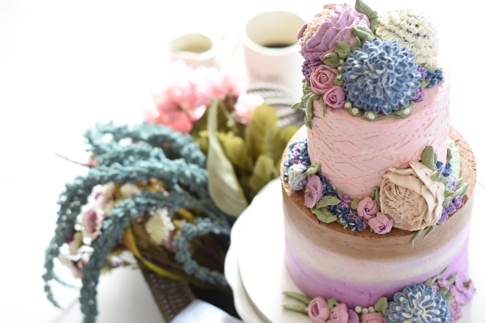 selective focus photography of pink icing covered cake