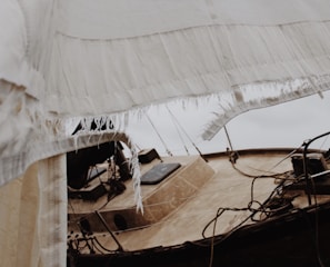 Nautical textile with reinforced stitching on a boat sail