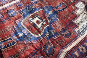 maroon and blue textile