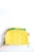 A person holds a colorful piñata designed to look like a taco. The piñata features a bright yellow shell with textured details and multicolored paper resembling toppings such as lettuce, cheese, and tomato. The background is plain white, emphasizing the piñata's vibrant colors.