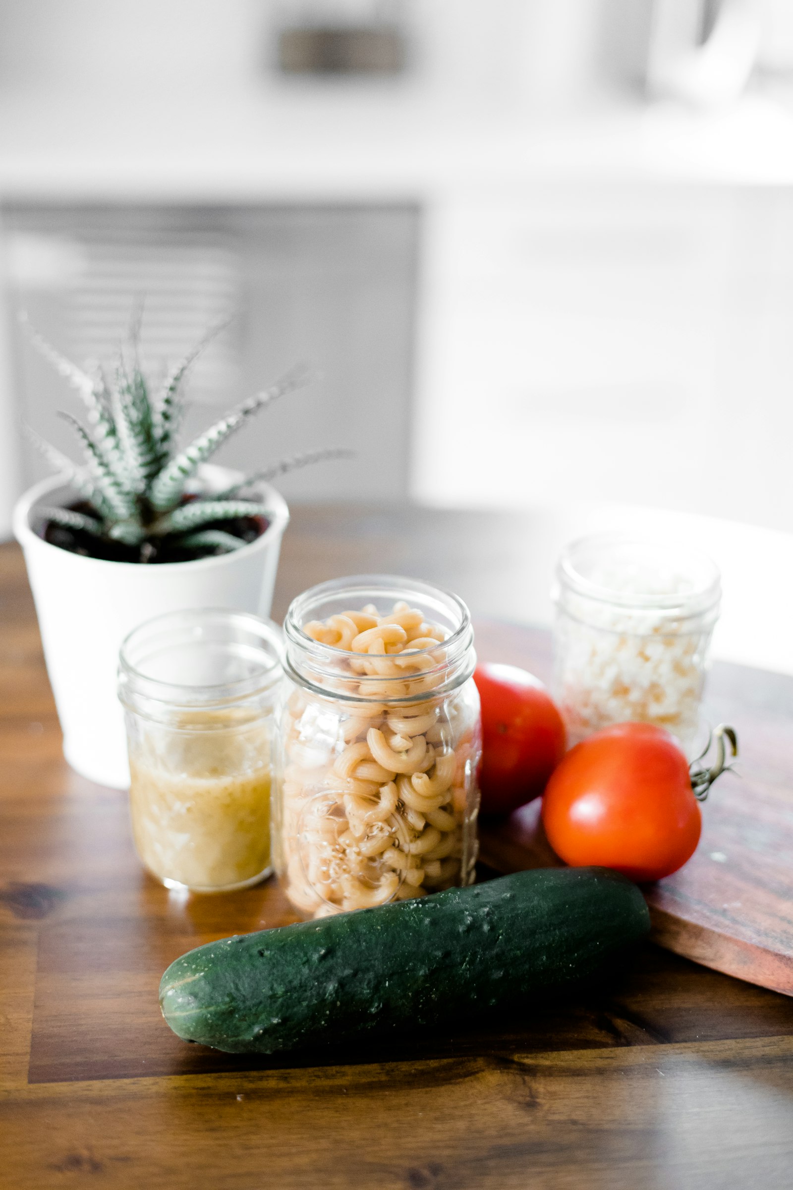 Canon EOS 5D Mark IV + Canon EF 50mm F1.4 USM sample photo. Green cucumber near jars photography