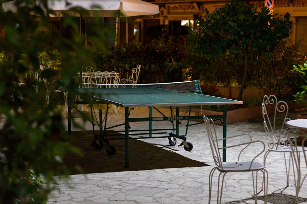 green table tennis during daytime