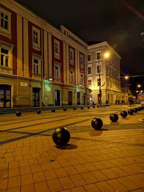 Evening cityscape of Melbourne with a model in a ghetto fabulous tracksuit illuminated by streetlights.