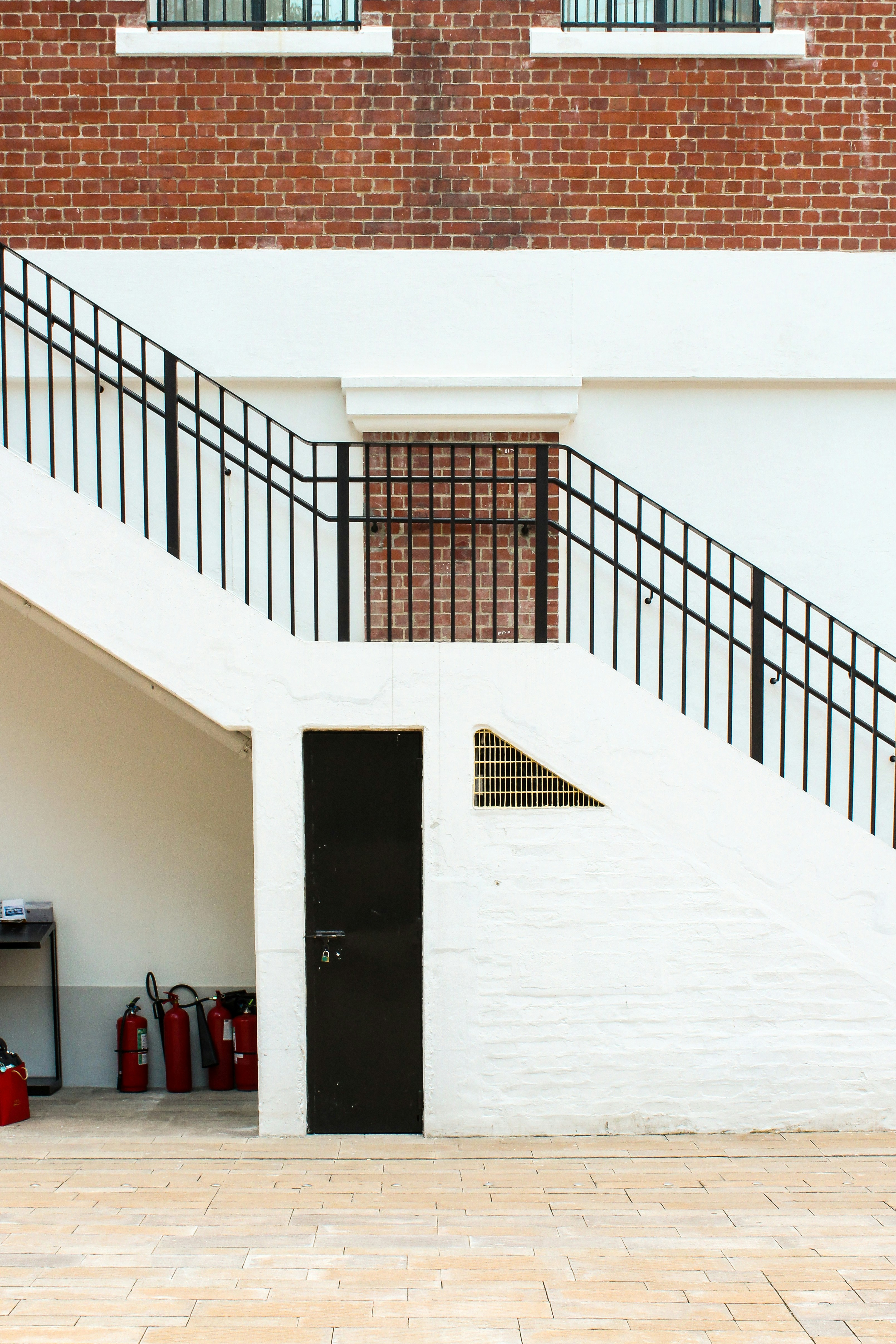 Black and white concrete stairs with no people inside building photo