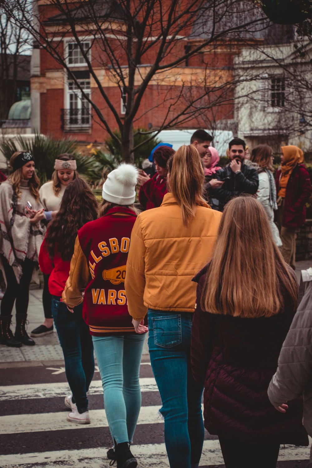 people crossing on pedestrian lane