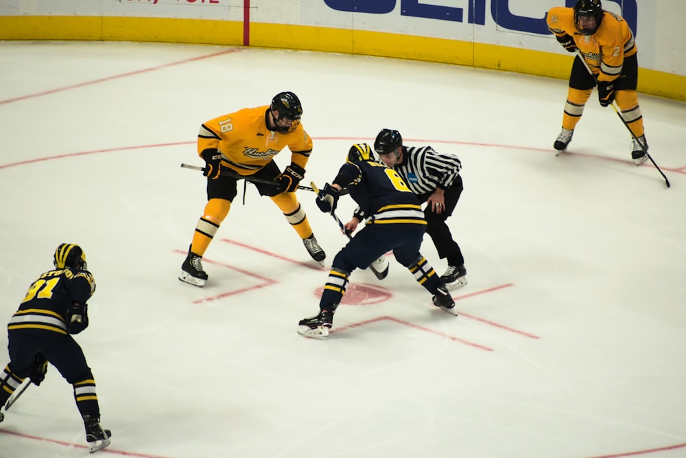 men playing ice hockey