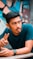 selective focus photography of man in green t-shirt