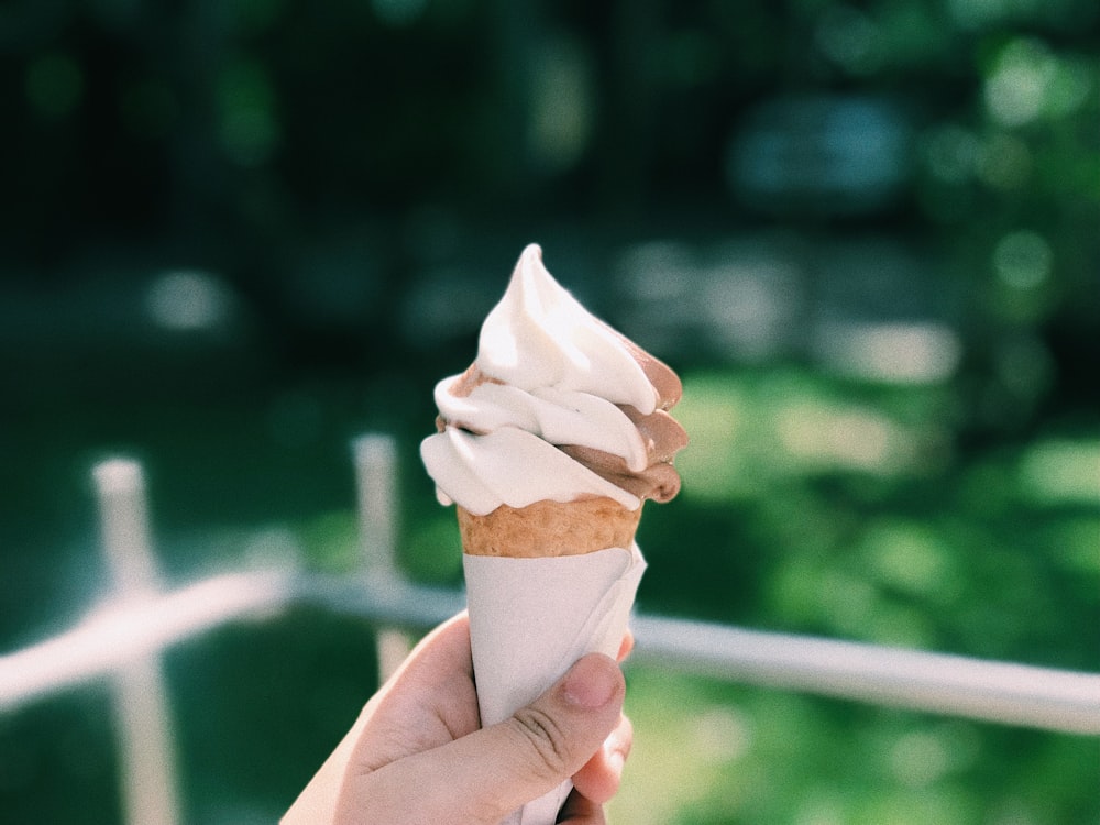person holding ice cream