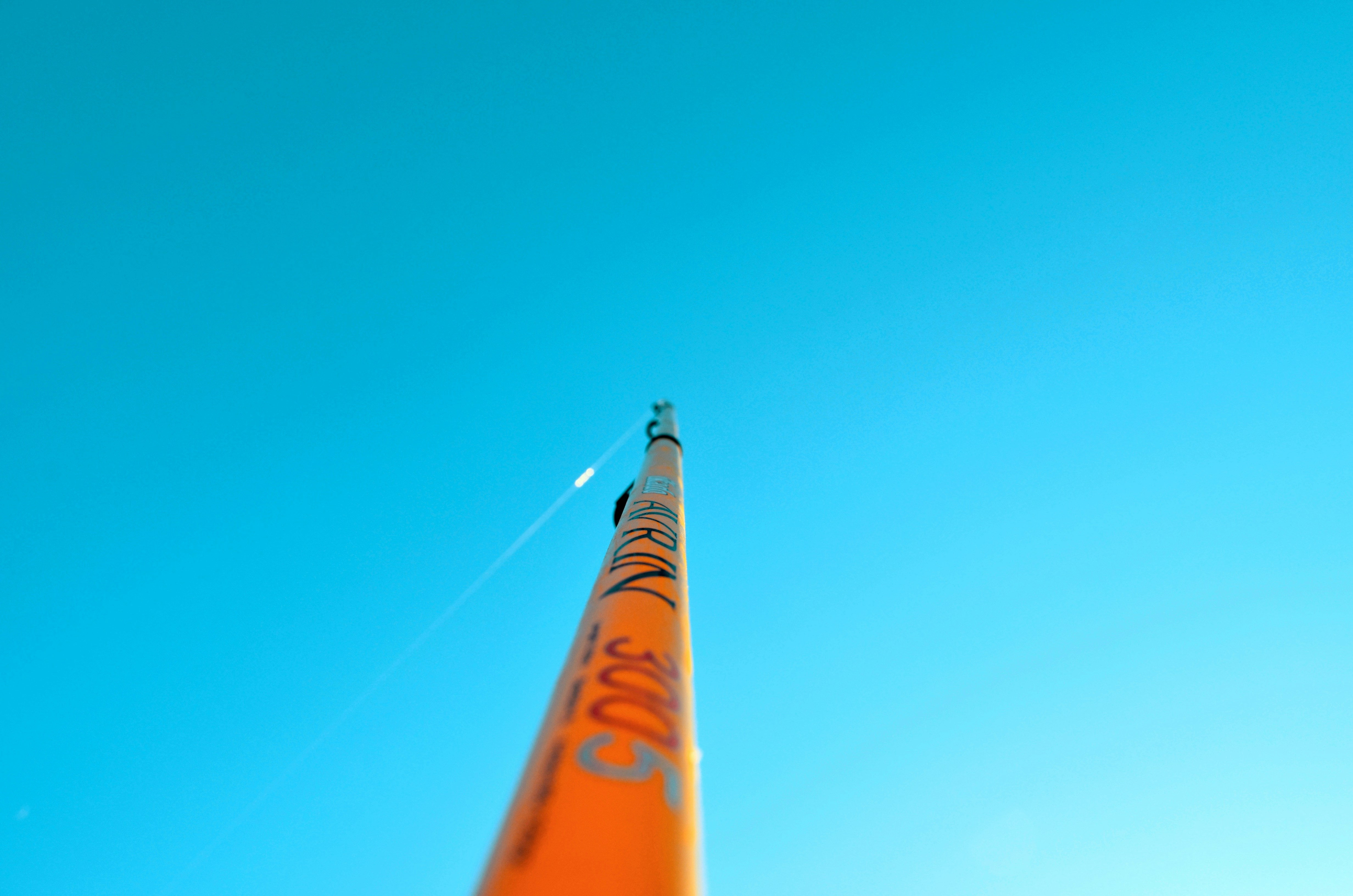 low-angle photography of rod