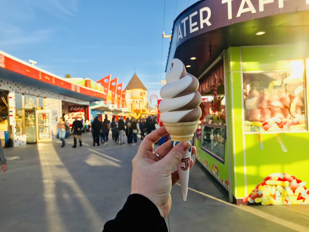 person holding ice cream