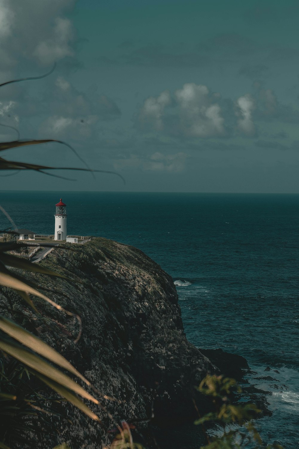 lighthouse and silo on cliff