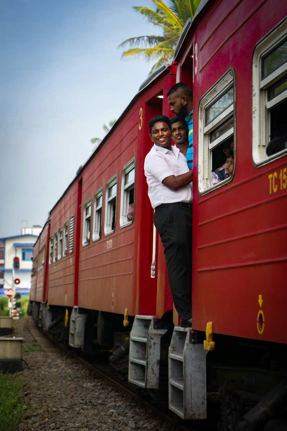 person on red train