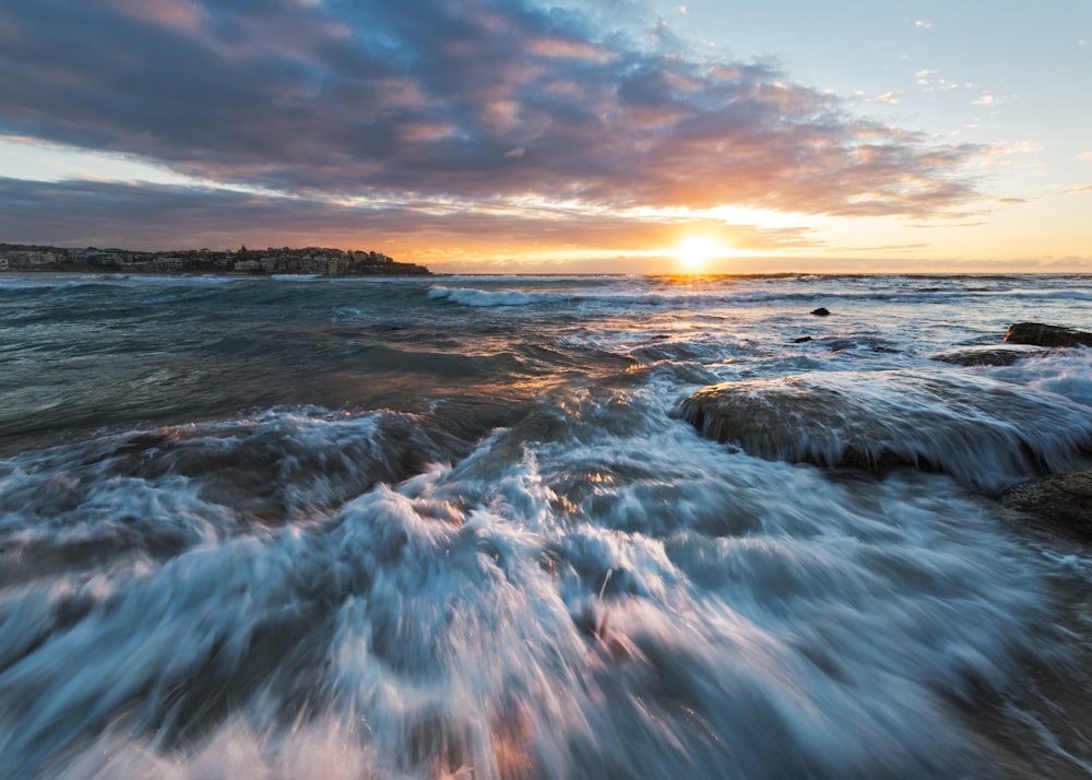 sea water during sunset