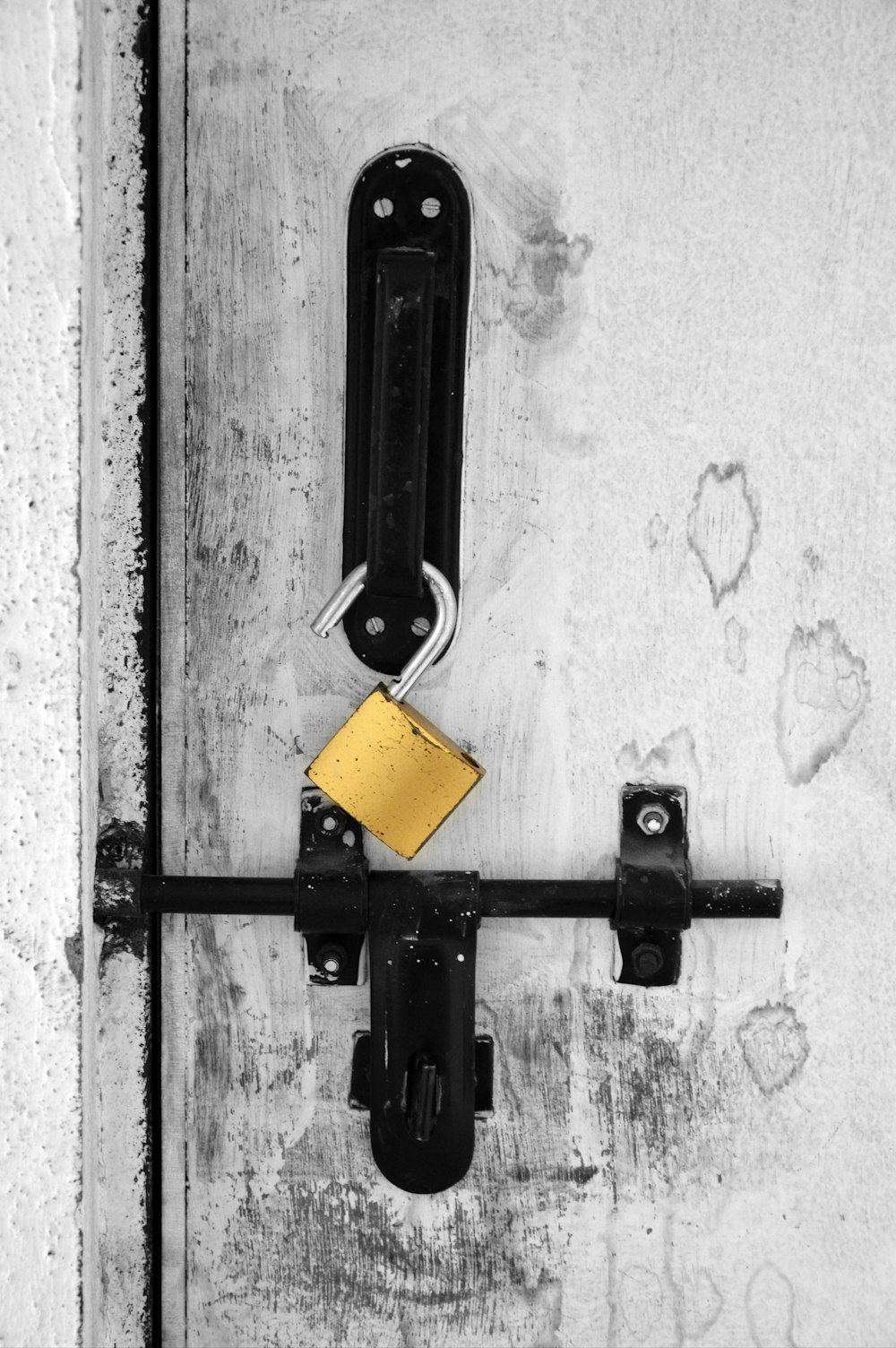 brown padlock on gray closed door