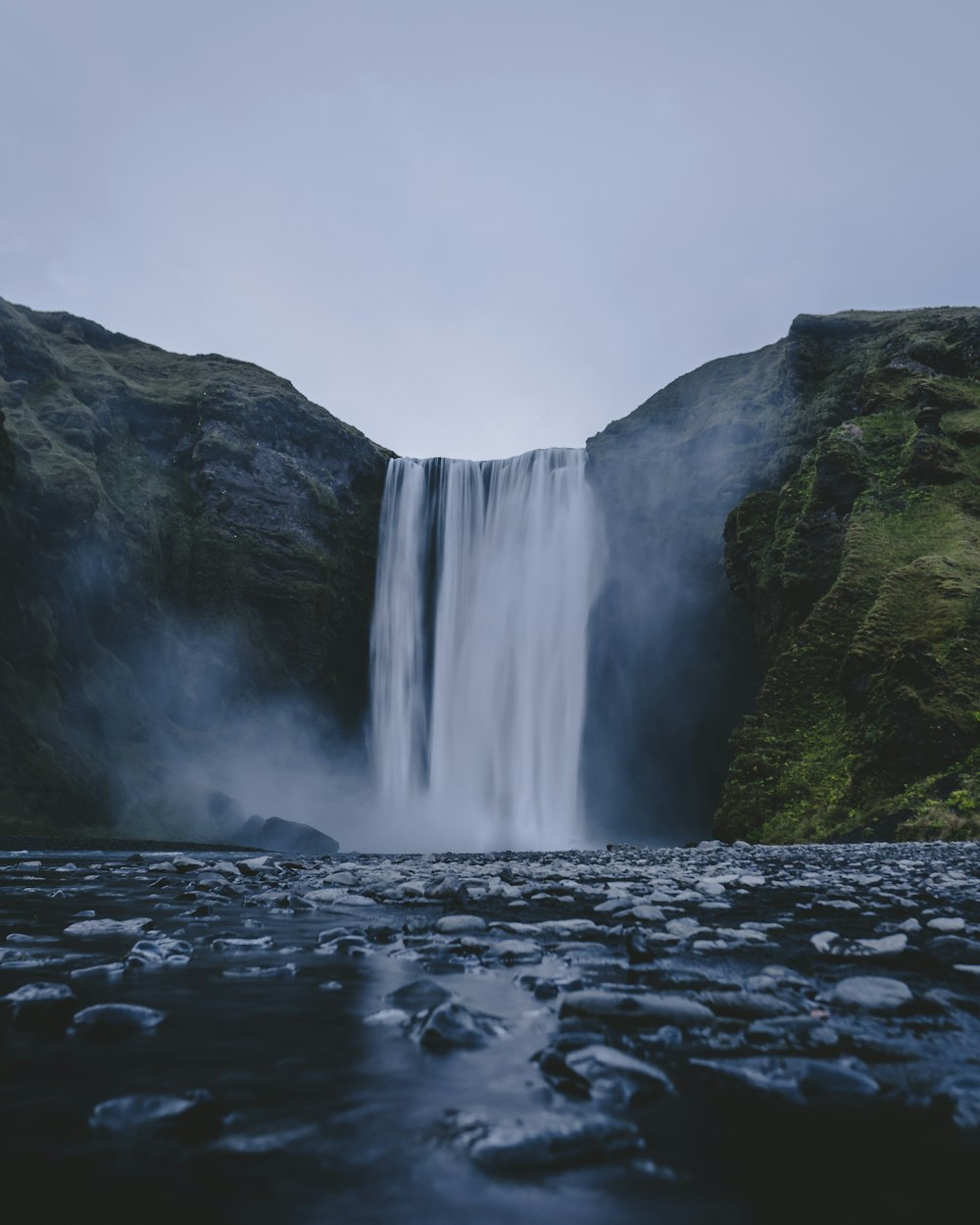 time-lapse photography of rippling plunge waterfalls