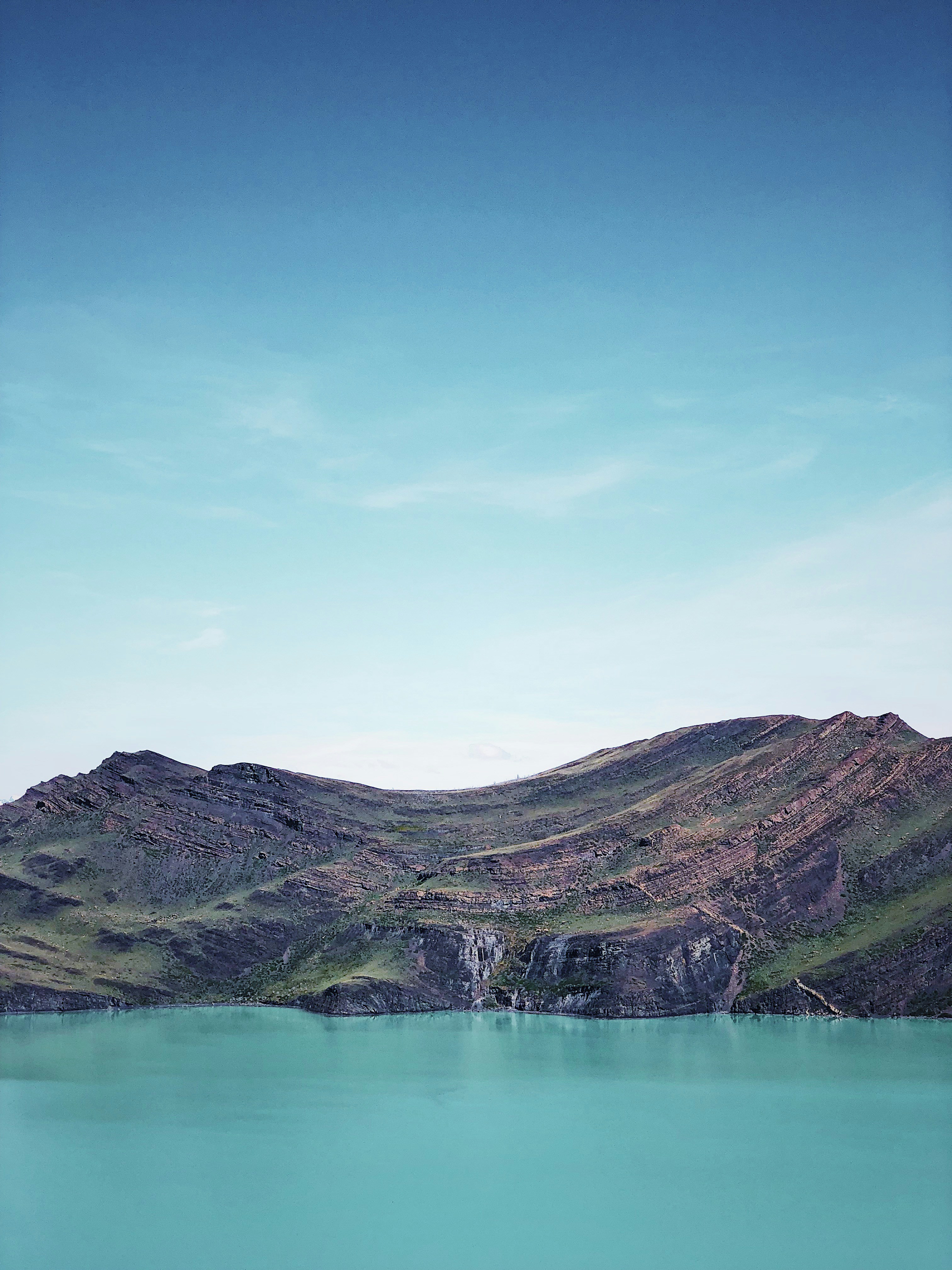 blue lake on mountain slope