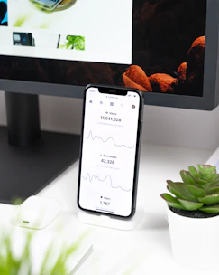 A smartphone displaying analytics for paid search ads performance.