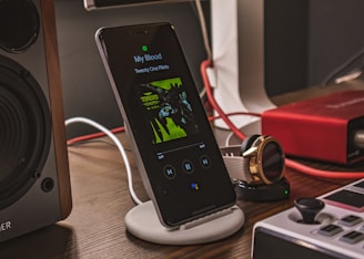 charging smartphone beside smartwatch