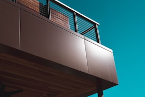 A panoramic view of a luxury steel villa showcasing its clean lines and steel blue accents.