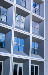 gray concrete framed glass building