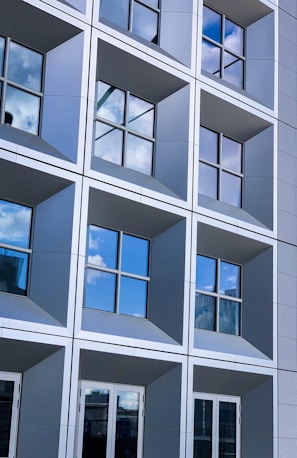 gray concrete framed glass building