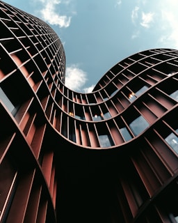 low-angle photography of brown building during daytime