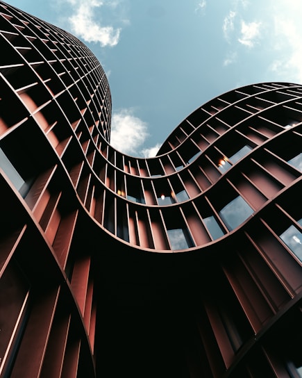 low-angle photography of brown building during daytime
