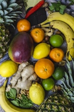 lemon, avocado, ginger, orange fruit, bananas and calamdin