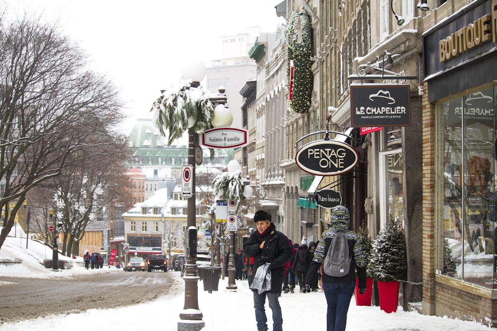 people walking outdoor near the road