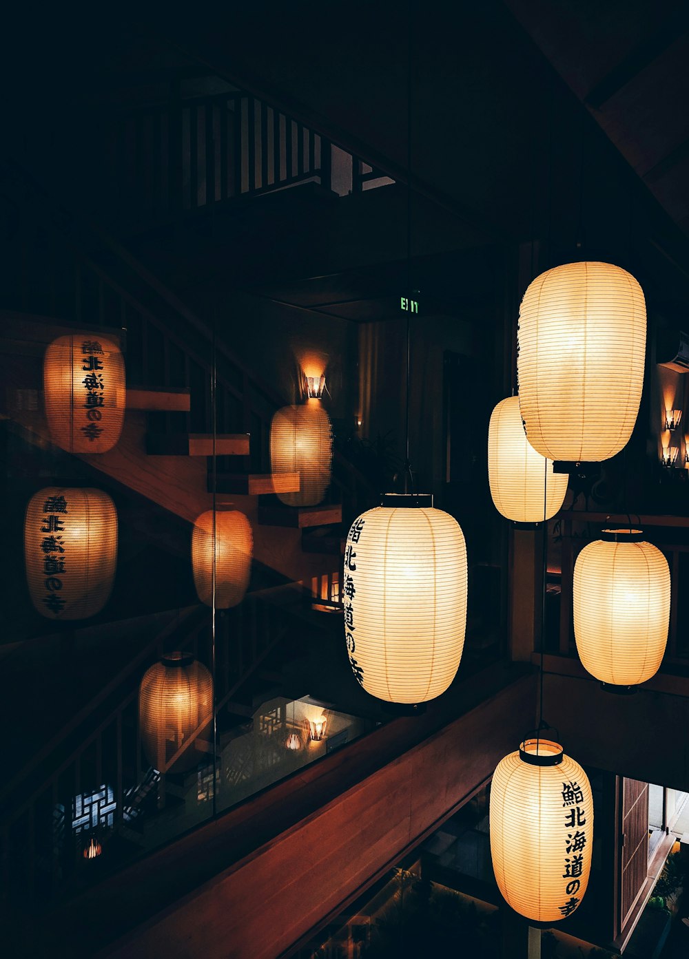 white and black lantern lamp turned-on