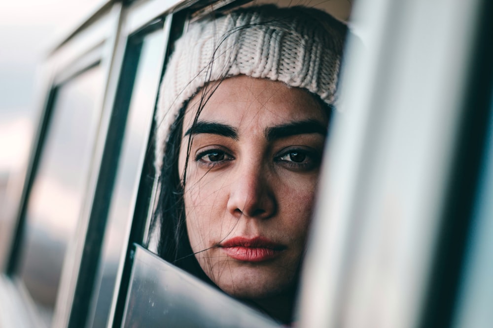 woman sitting inside car