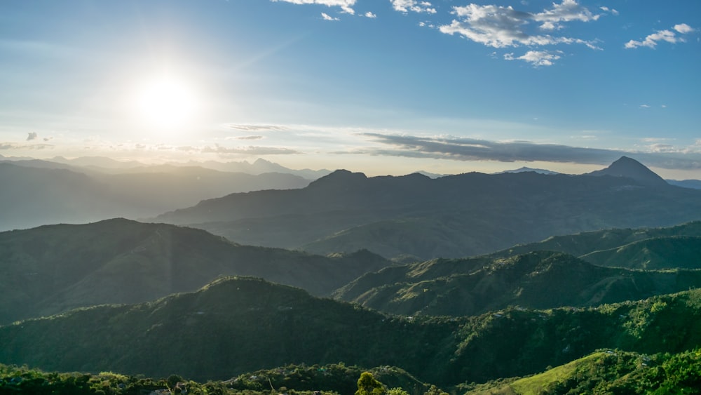 mountain range under clear blue sky