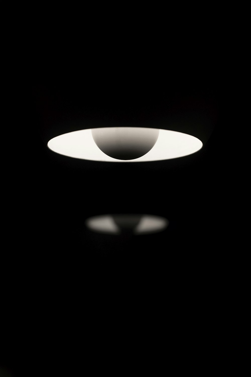 white and black pendant lamp