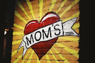 red and white heart mom's graffiti