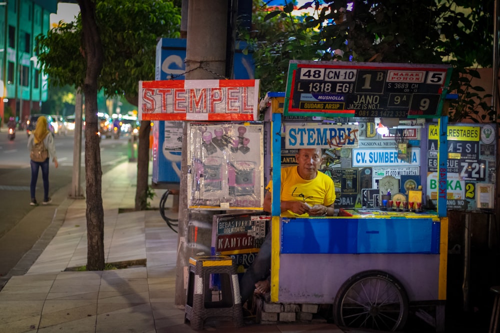 man sitting inside the store