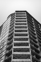 gray concrete building grayscale photography