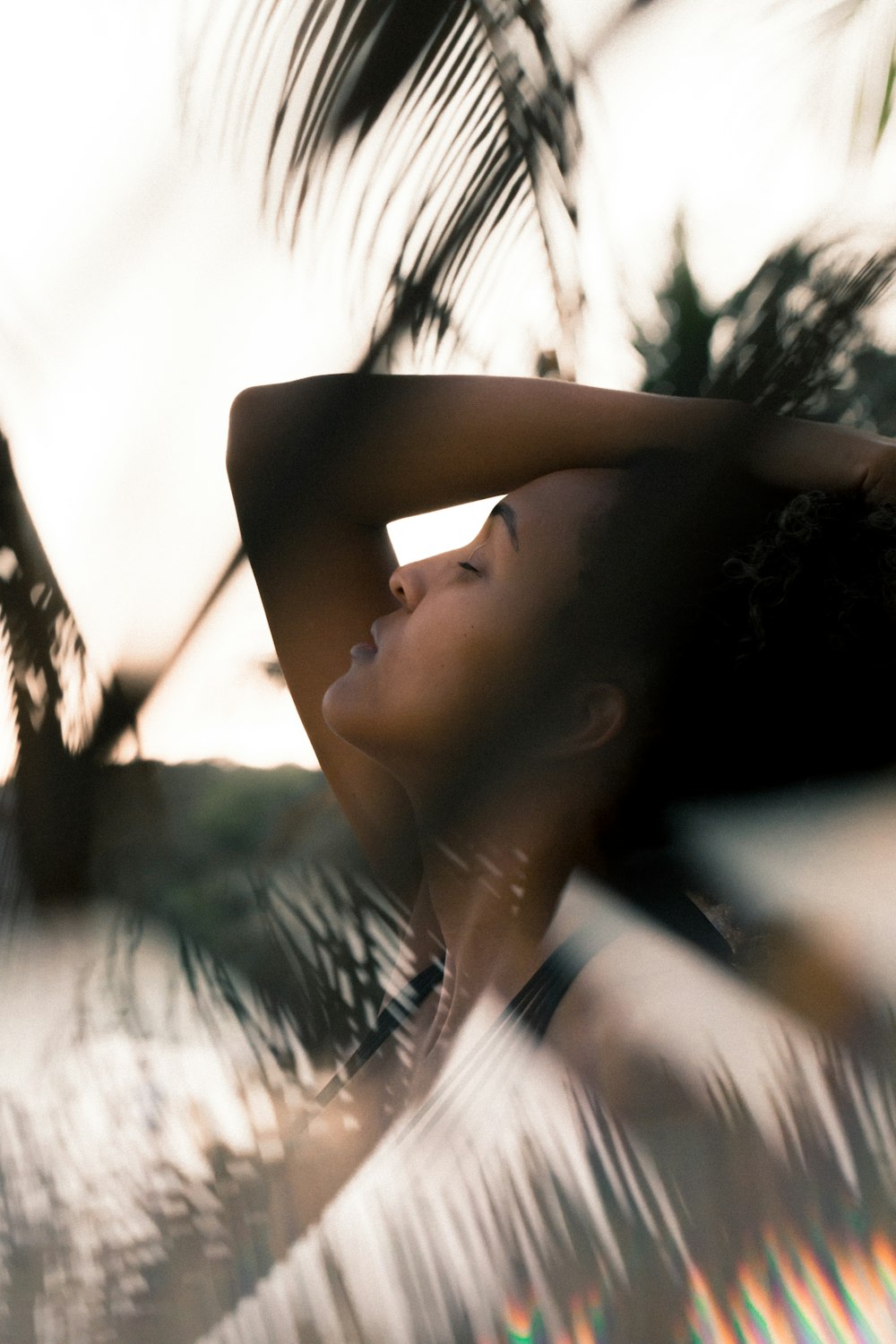 woman resting near tree