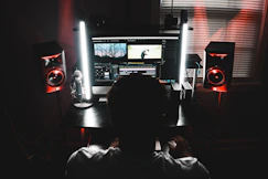 man using computer inside room