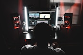 man using computer inside room